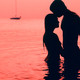 Follar en la playa i