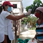 Activistas de la Cruz Roja apoyan labor sanitaria en Diez de Octubre