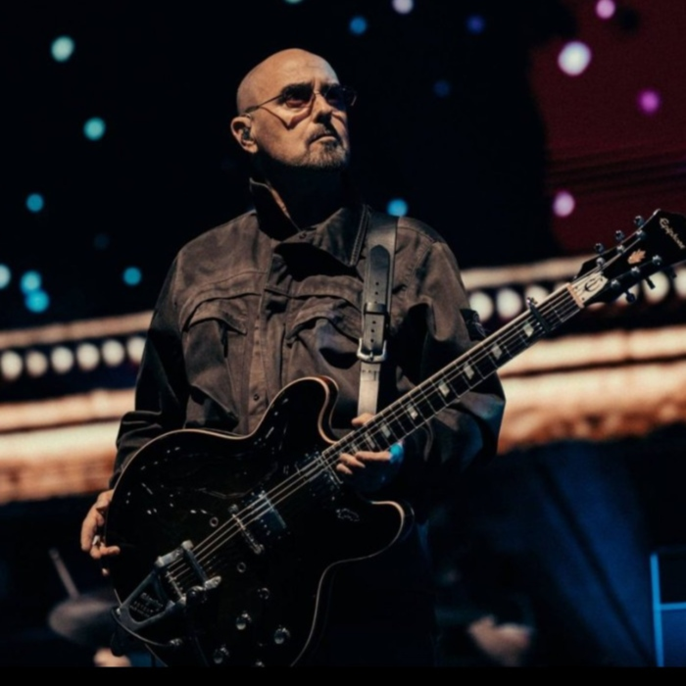El guitarrista fundador de Oasis, Paul “Bonehead” Arthurs, se perderá parte de la gira mundial por un cáncer episode artwork